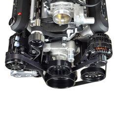 Top front view of black anodized accessory drive system on a Chevy LS engine with a Magnuson supercharger